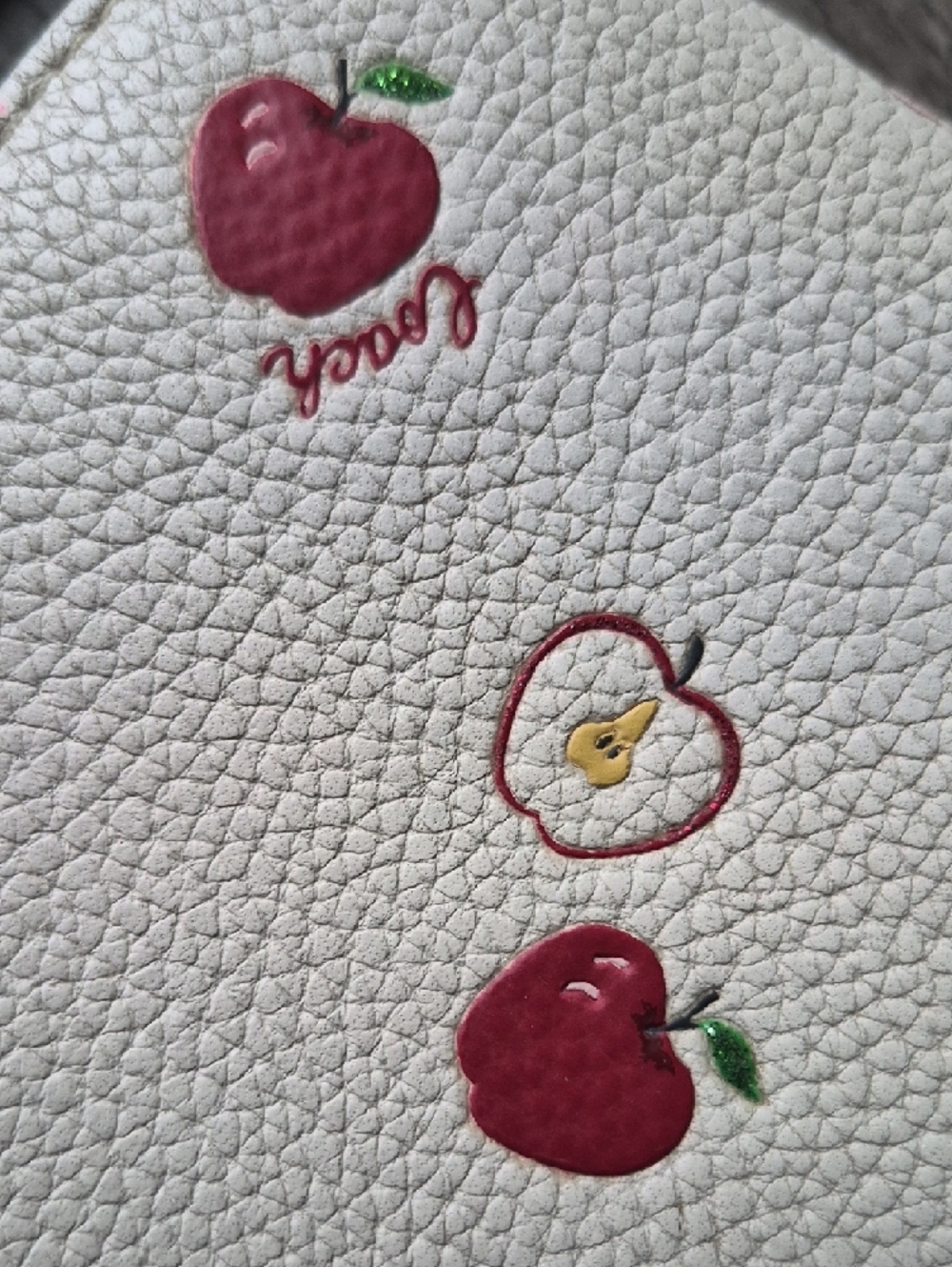 Coach Anna Foldover Clutch Crossbody Bag in a white color with a red apple print - Picture 16 of 16